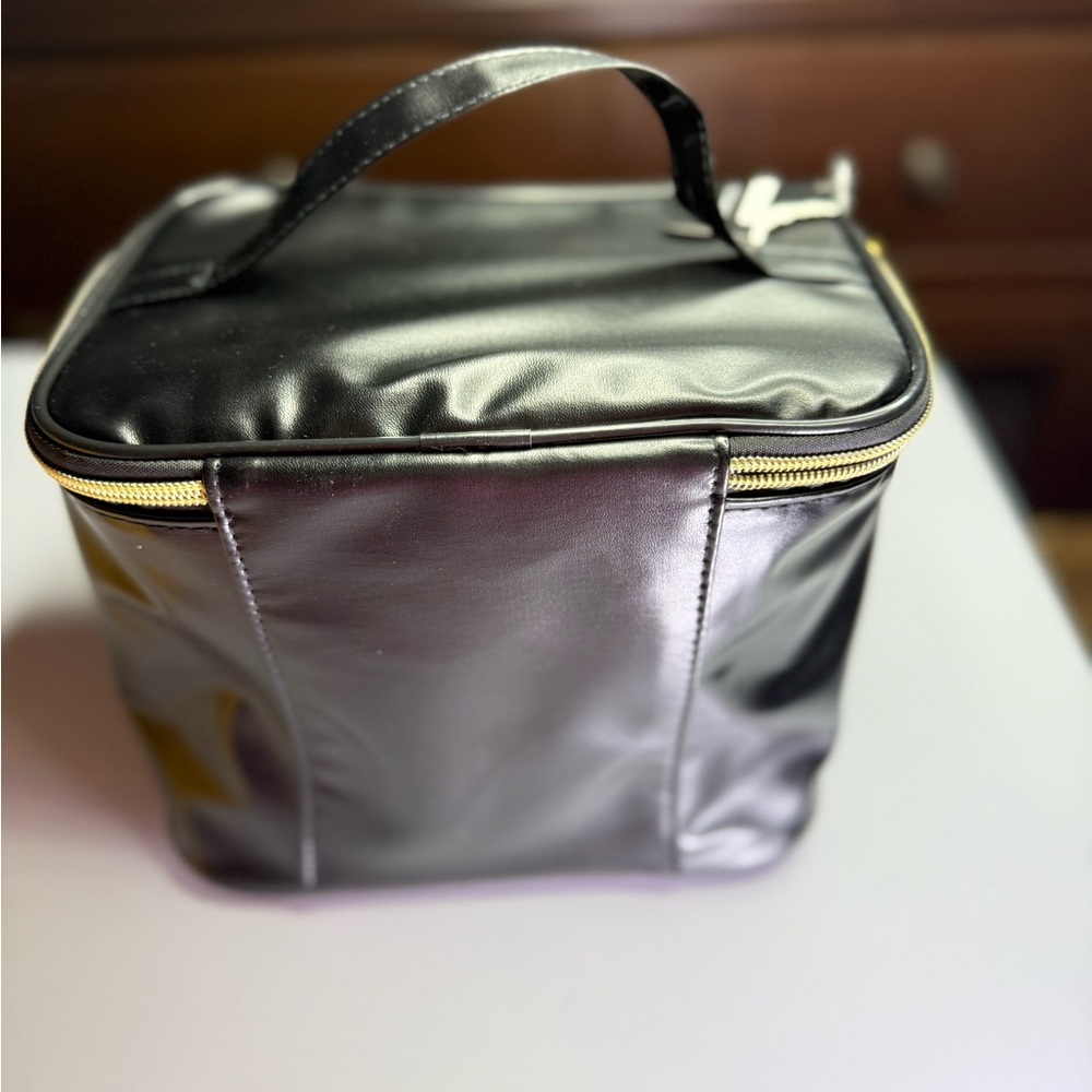 Black and gold makeup bag #makeupessentials